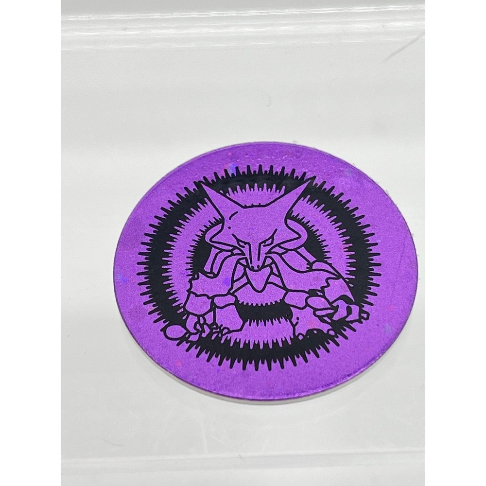 Pokemon TCG Alakazam Purple Sparkle Holo Flip Coin 2000 Wizards Nintendo